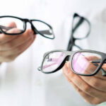 Optician Holding Glasses 1280x853 640x427 1