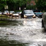 cars in flood water royalty free image 1591016539